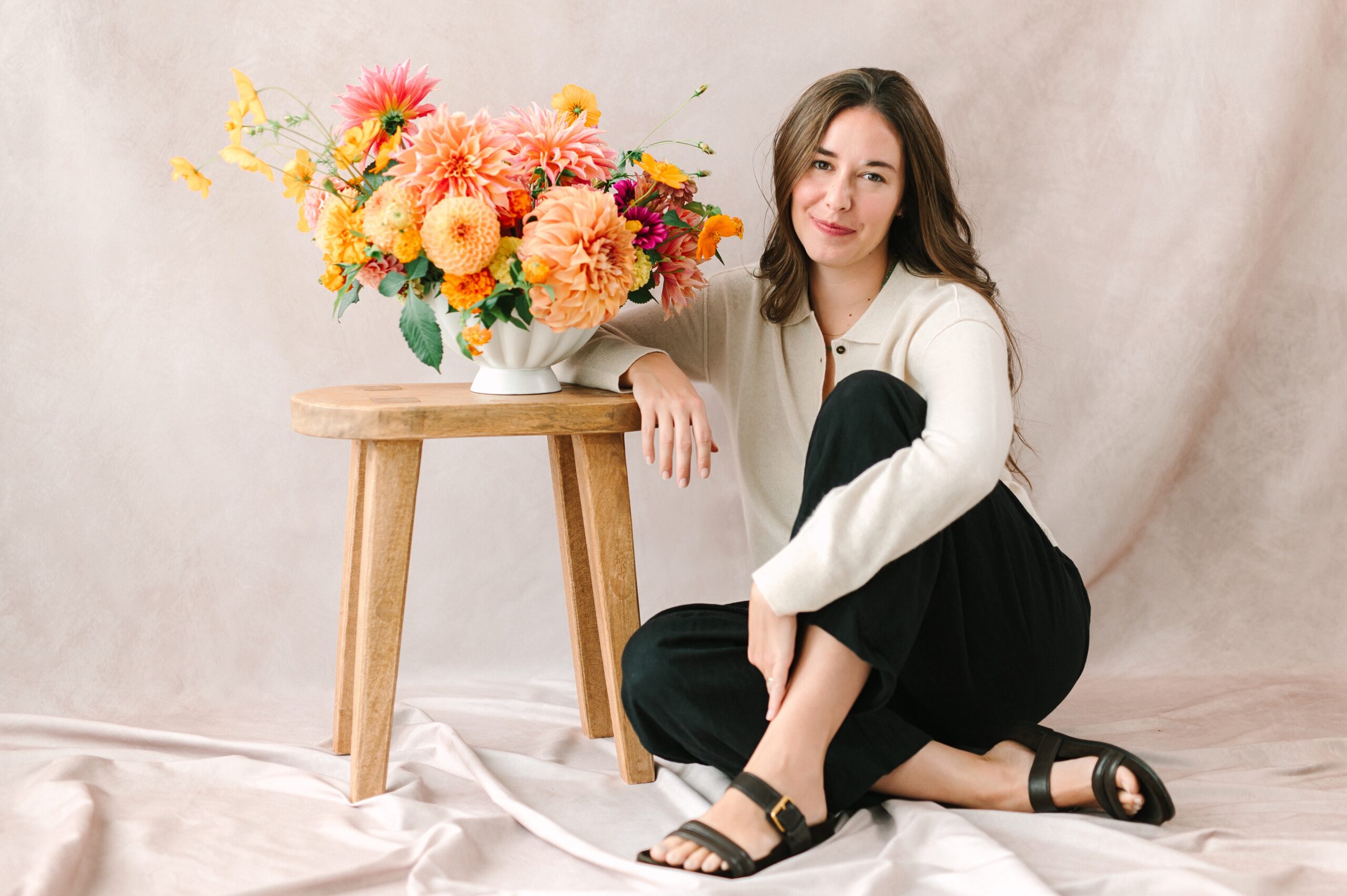 Florist Posing for headshot with floral work