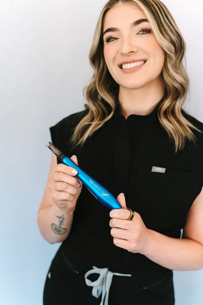 Close-up branding photo of Skin by Victoria holding a professional skincare tool during a Brand Gloss photoshoot.