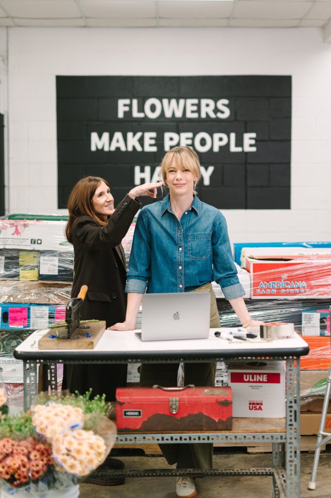 Sister-led flower market leadership captured through branding photography in their workspace