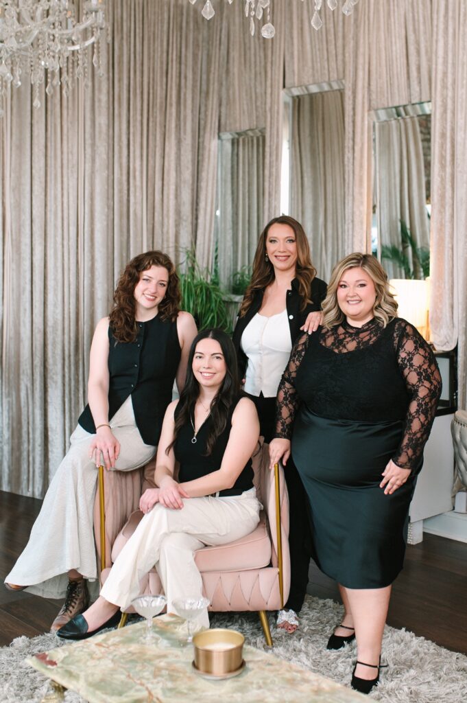 Group portrait of a wedding makeup and hair artist team for brand photography.