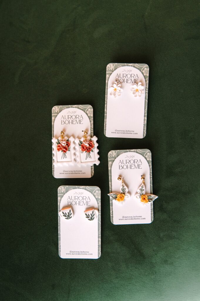 Handmade boutique earrings displayed in a styled flat lay for product branding photos