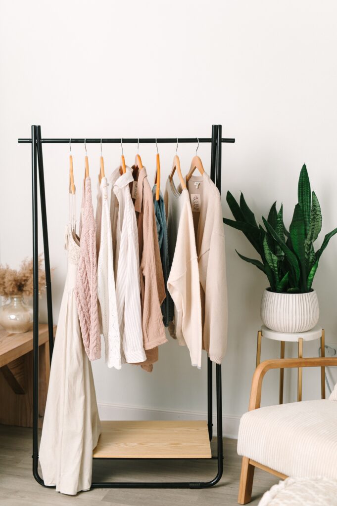 Styled clothing rack with boutique outfits during branding photoshoot in Richmond VA