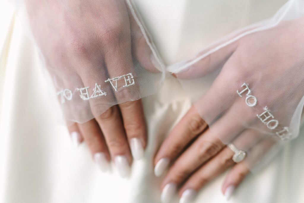 Detail photo of a bride's hands.