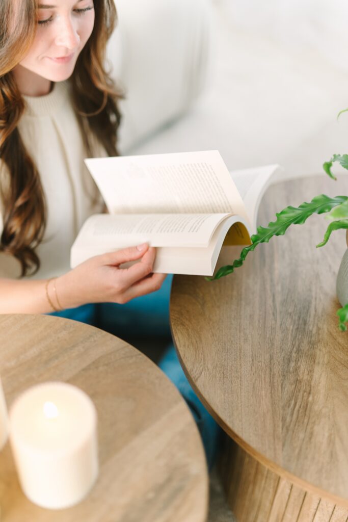 Therapist reads book during her personal branding session