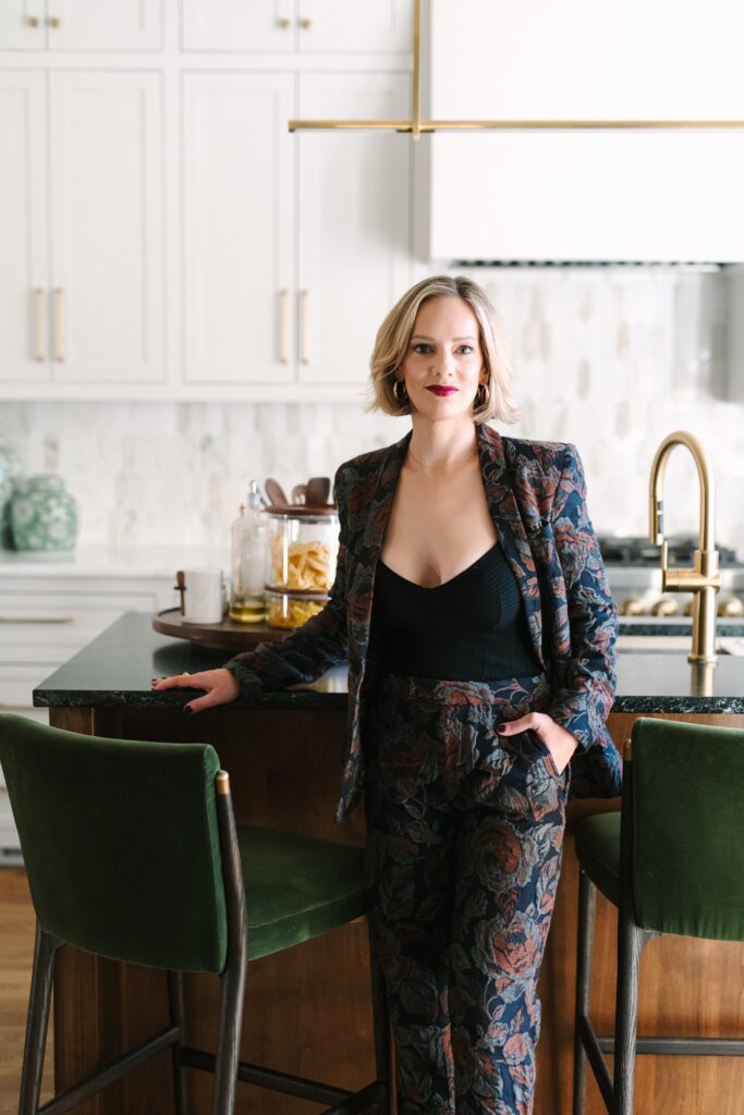 Interior designer Lyndee McQuarrie posing inside a luxury Richmond Virginia home during a personal branding photography session.